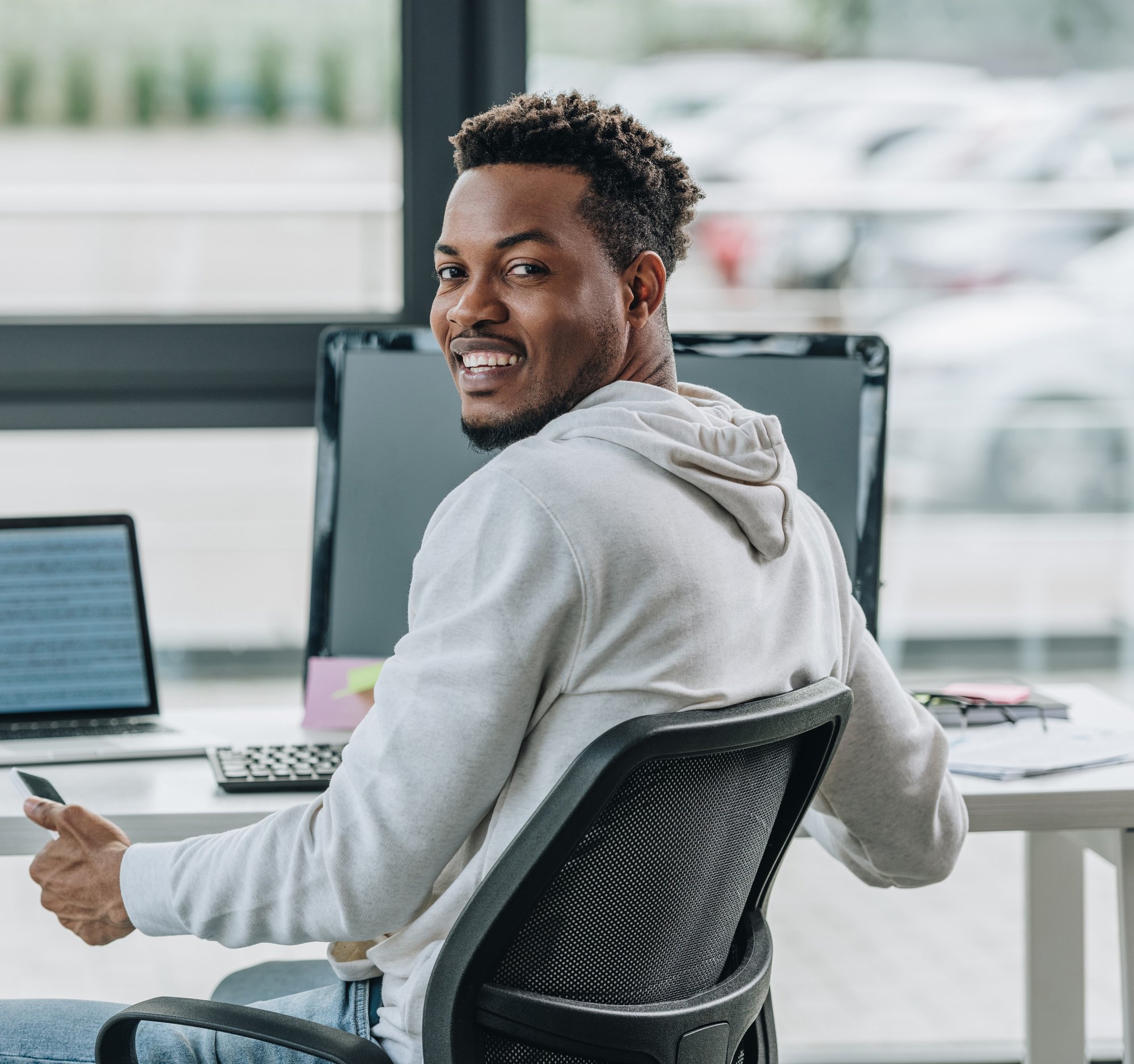 young adult male at computer